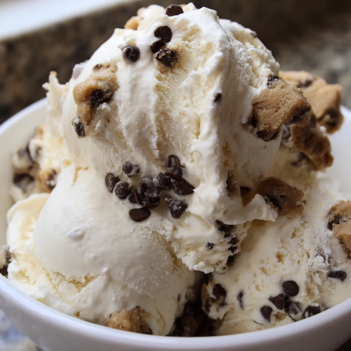 Refreshing cottage cheese ice cream, showcasing delightful bursts of chocolate chip cookie dough.