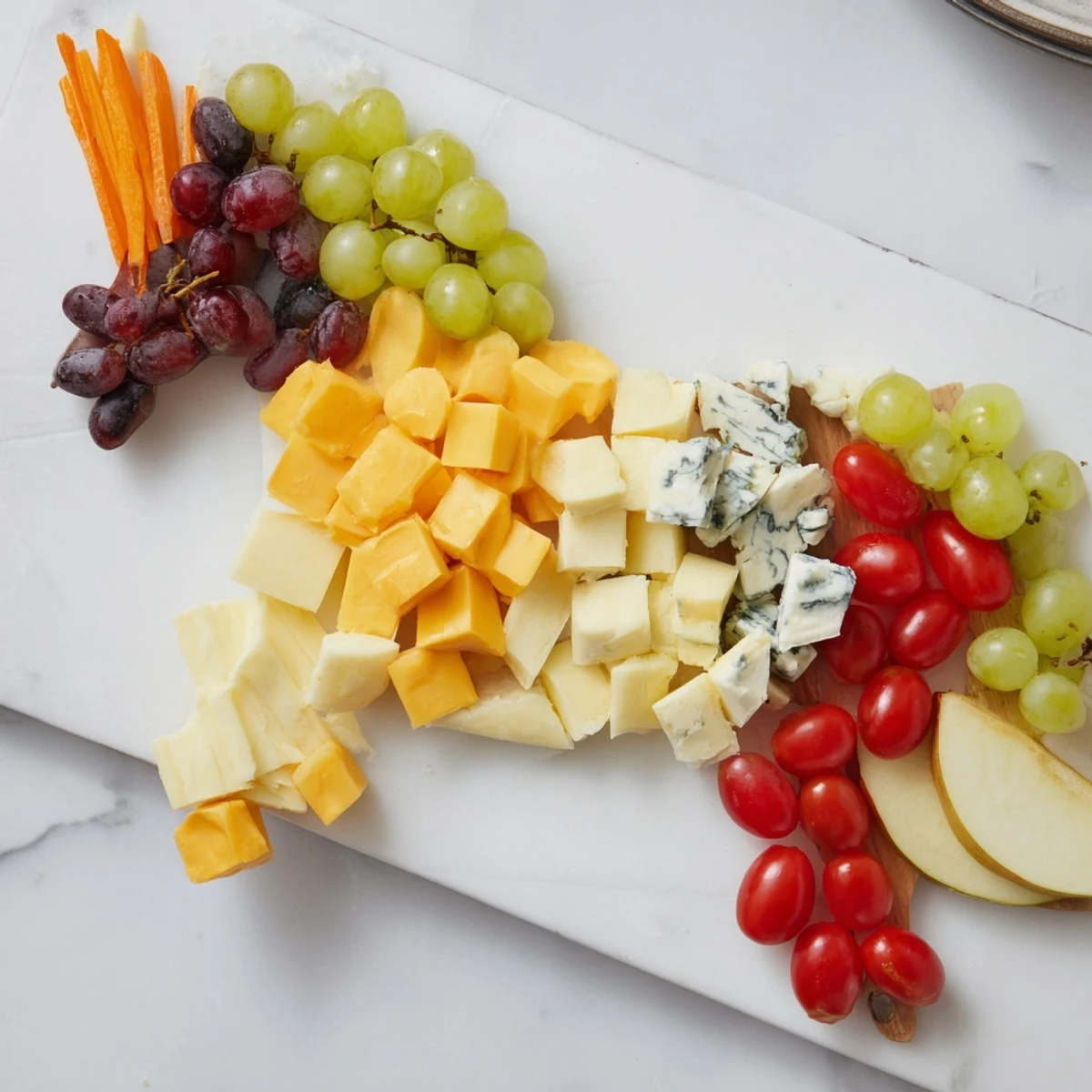 This festive horse-shaped grazing board features visually appealing cheeses, meats, crackers, and accouterments, ready to be enjoyed.