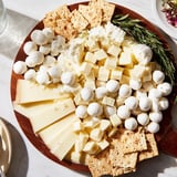 Festive Santa's Beard and Hat Board, showcasing a vibrant red hat alongside a snowy beard, ready to serve.
