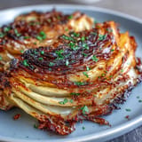 Hearty, tender roasted cabbage steaks with a crisp, smoky paprika edge.