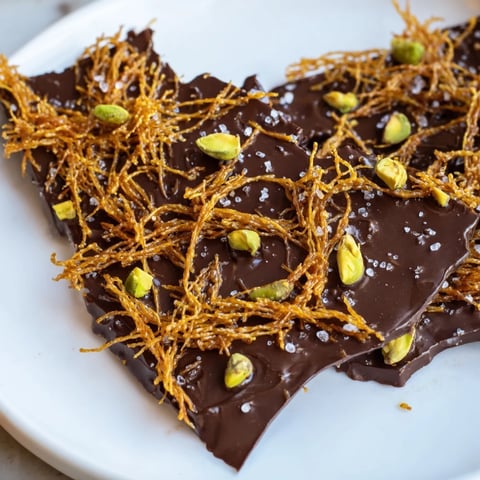 Golden Kataifi Chocolate Crunch Bark: a close-up of the delicious, crispy dessert sprinkled with sea salt.