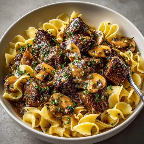 Creamy, homemade beef and mushroom gravy recipe slow-cooked to flavorful perfection.