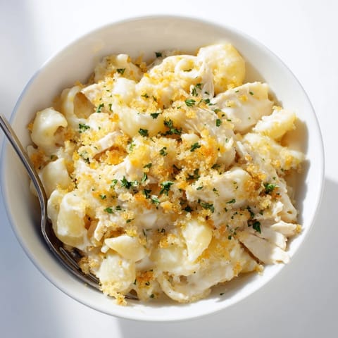 Creamy Mac and Cheese Chicken Alfredo Bake: Cheesy, savory comfort food in a casserole.