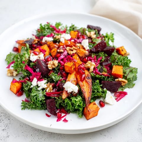 Beautifully plated Hot Girl Winter Salad with colorful roasted veggies and a tangy citrus dressing.