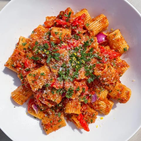 Close-up of the finished One-Pot Diavola Spicy Pasta, showcasing the vibrant red sauce and perfectly cooked pasta.