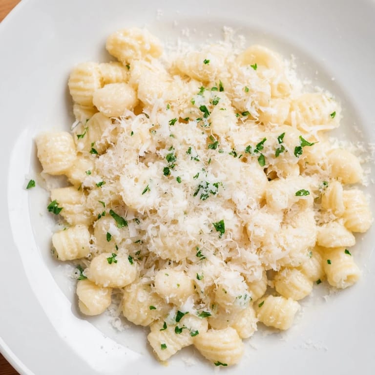A close-up of delicious 15-Minute Garlic Parmesan Pasta; the perfect quick, comforting Italian dinner.